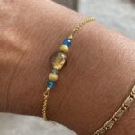 Armkettchen Orion vergoldet mit blauem Apatit facettiert